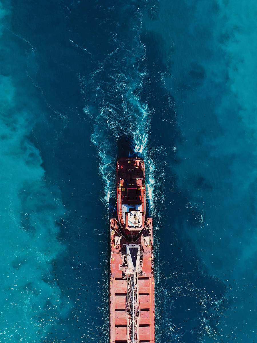 bluewater bridge bird's-eye view photography of boat on dock port huron